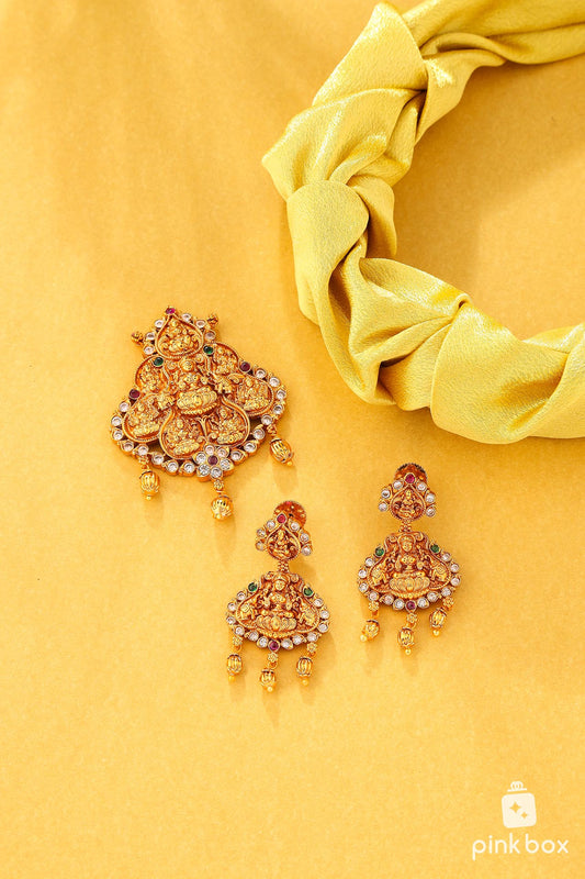 Antique pendant with Lakshmi devi idol and matching earrings