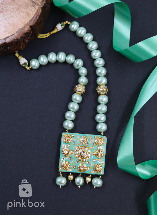 Beautiful Meenakari Pendant with Shell pearls with Earrings